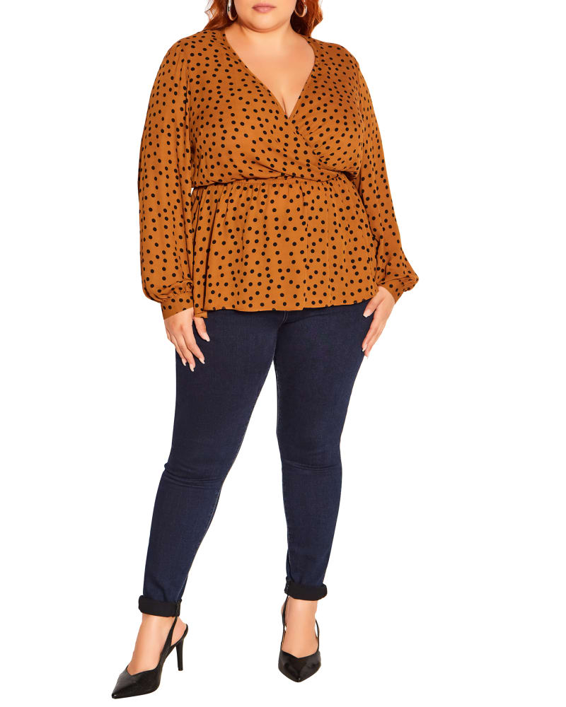 Front of a model wearing a size XXS Dotty Wrap Top in Caramel Black Spot by City Chic. | dia_product_style_image_id:234368